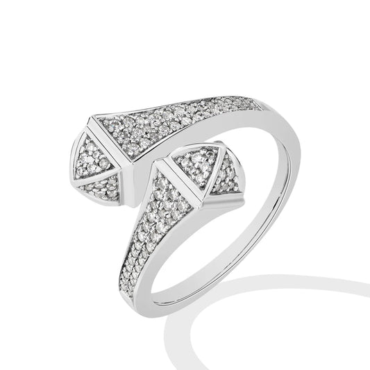 Silver ring with diamond accents on a white background.