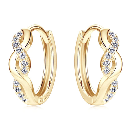 Gold hoop earrings with diamond accents on a white background