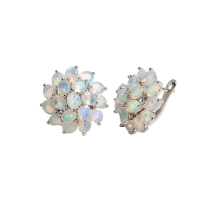Pair of opal earrings on a light gray background